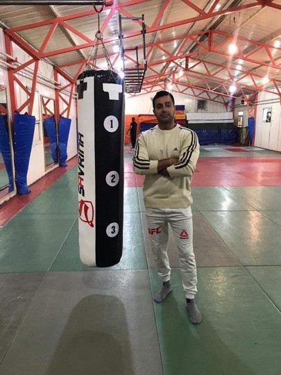 Mah in a martial arts training hall