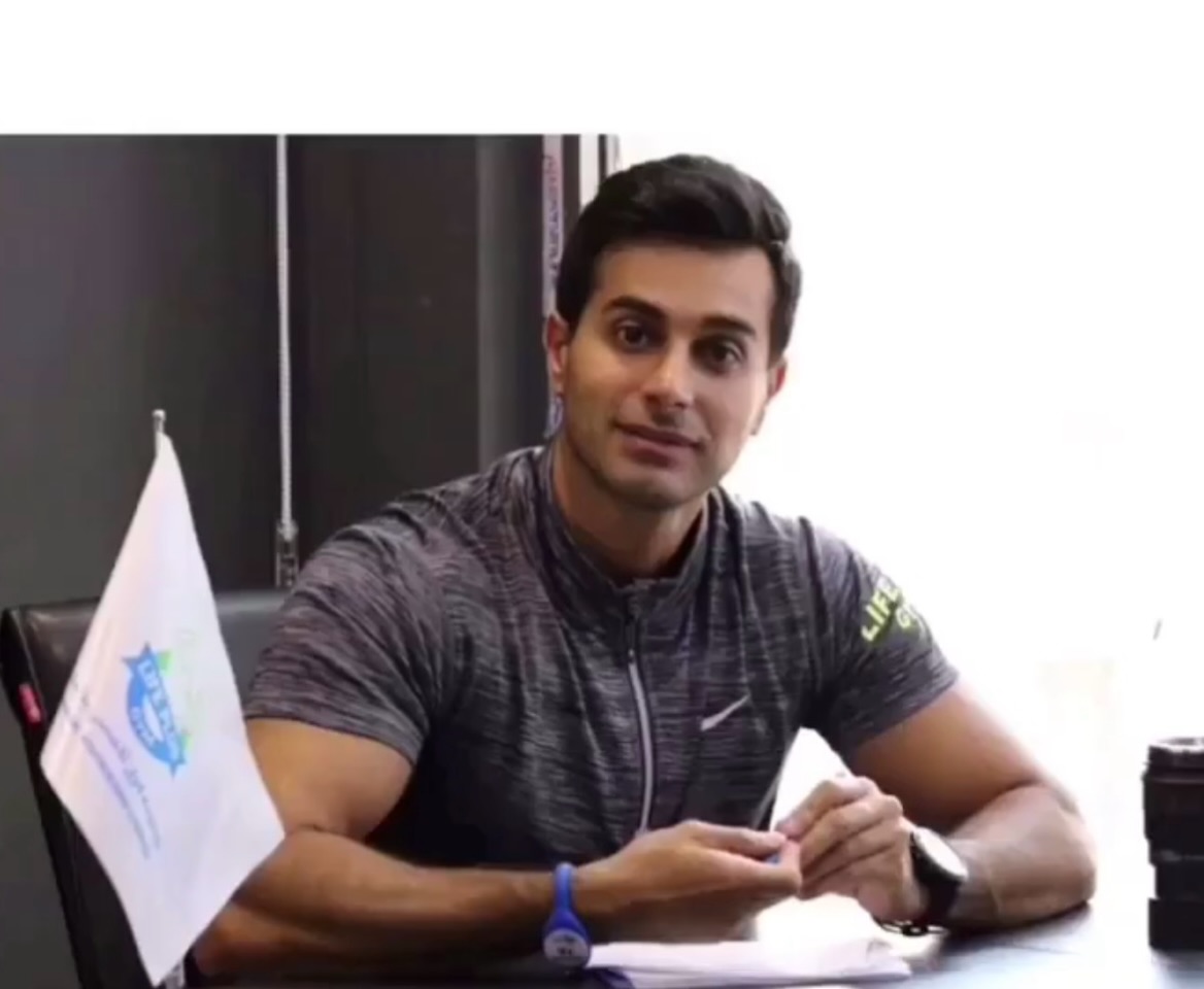 Mah Ghasemi at his desk